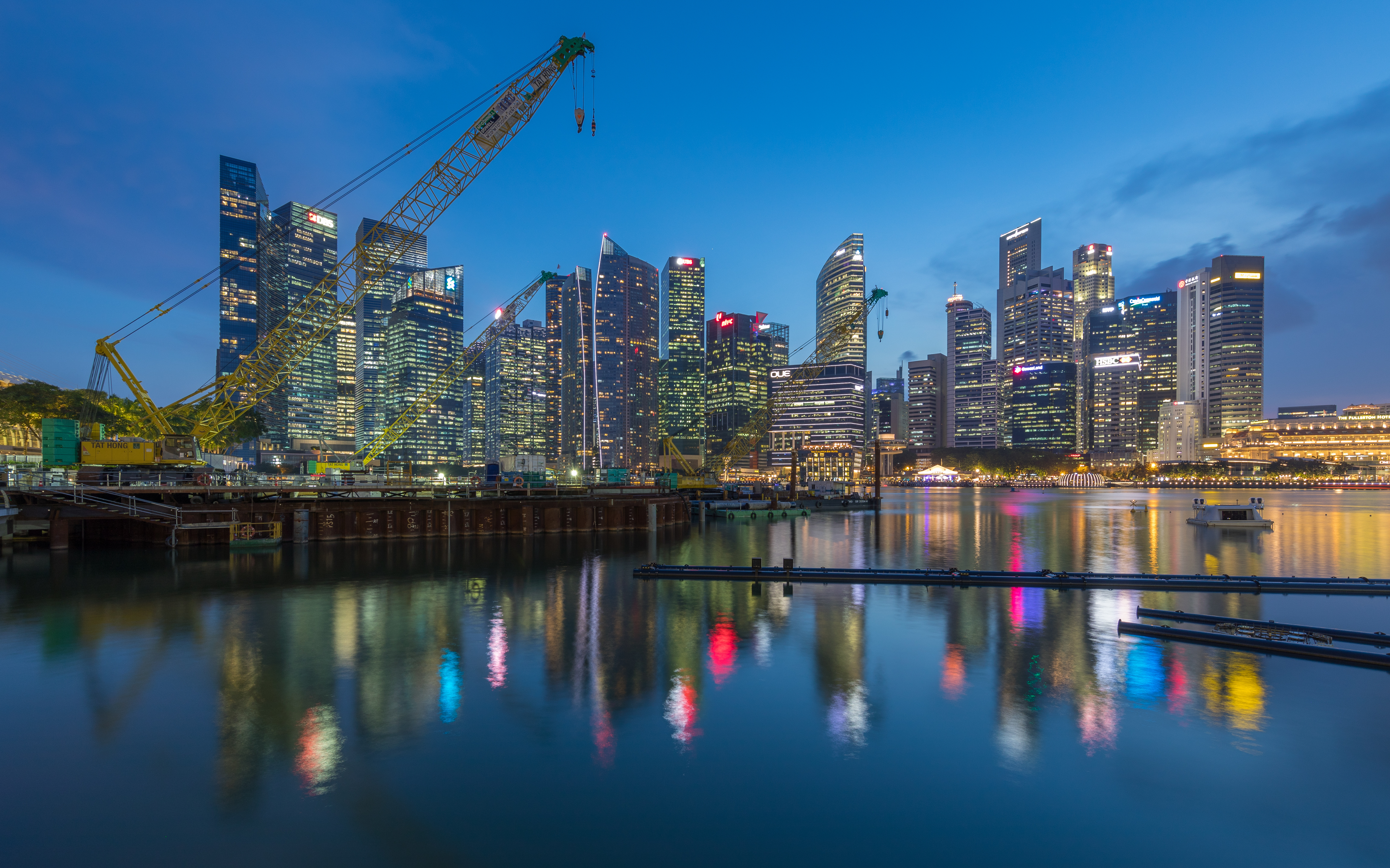 Singapore financial district skyline at dusk.